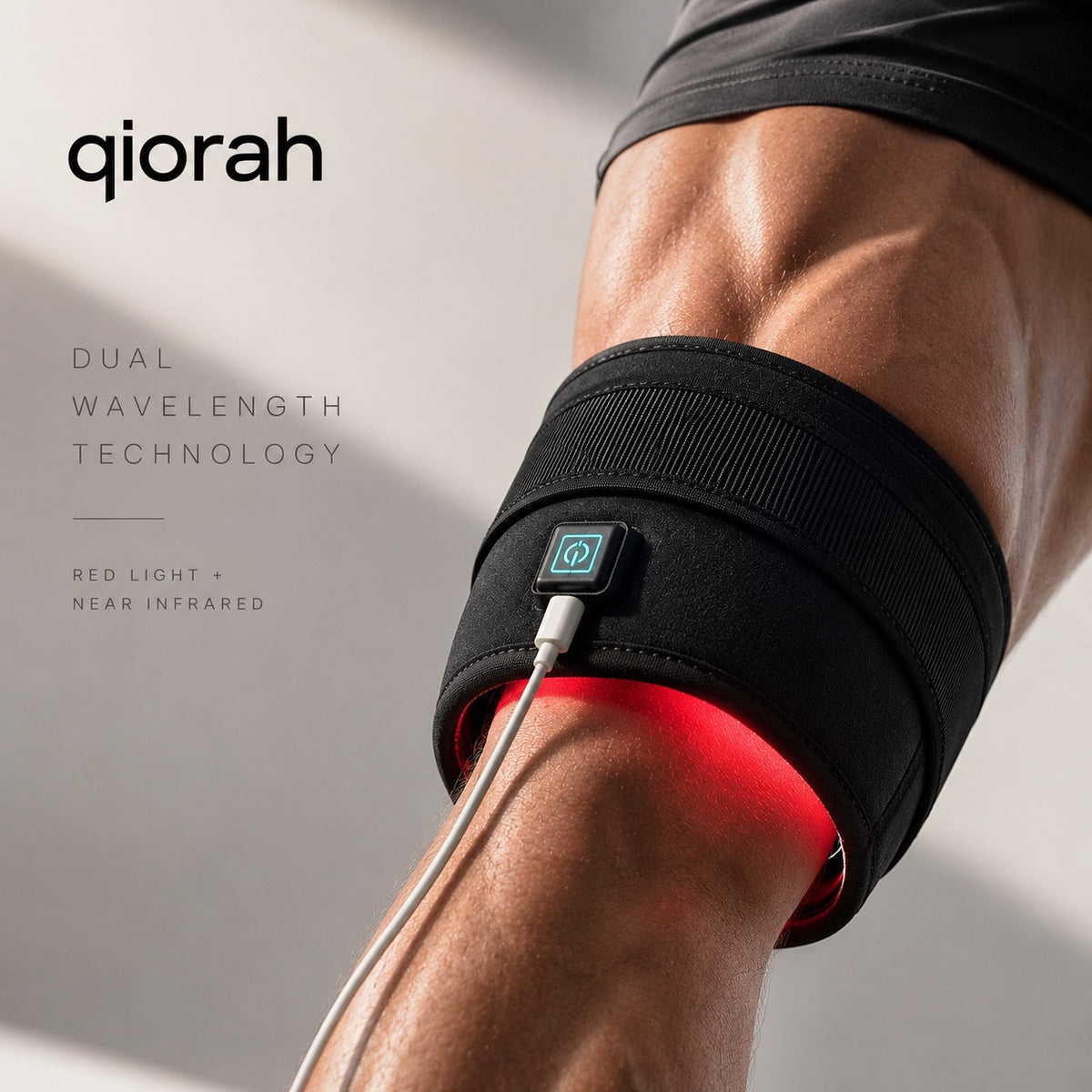 QIORAH dual wavelength red and near-infrared light therapy wrap worn on the upper arm
